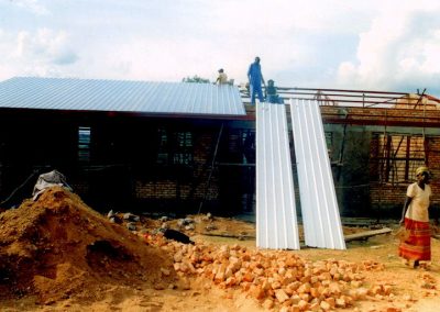 Completion of metal roof on classrooms.